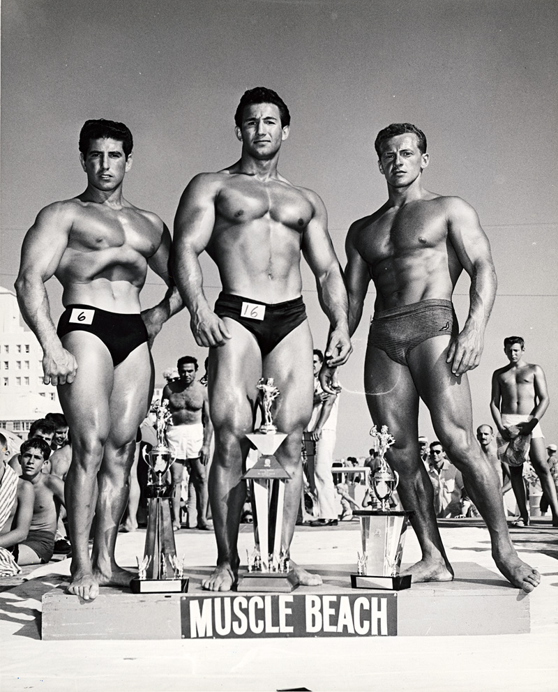 Lot 4111, Auction  126, Bruce of L.A., Three winners of bodybuilding contest, Muscle Beach, Santa Monica: Charles Collras, Hossein Shokouh und Jerry Boily; Nude of John Manning