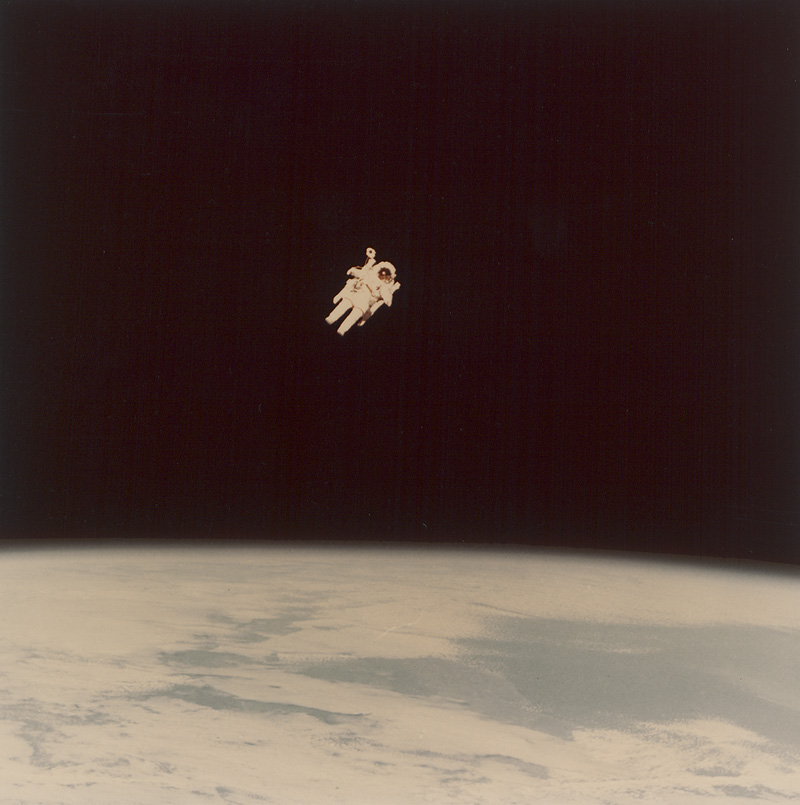 Lot 4252, Auction 127, NASA, Astronaut Bruce McCandless floating untethered in space during the STS-41B mission, Challenger. Feb. 7,1984